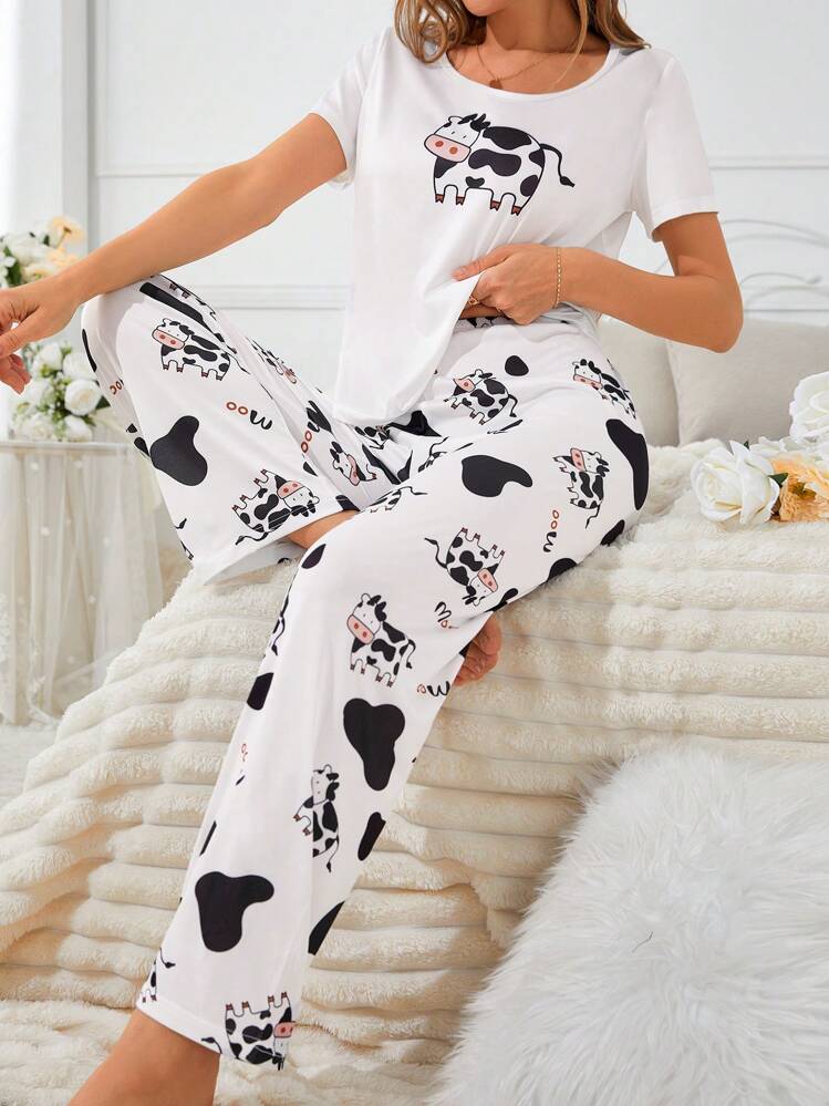shein-pigiami-donna-467ntt-1.jpg SHEIN Set di pigiami da donna a fantasia mucca con cartoni animati a standard di codice | SHEIN ITALIA - immagine 1